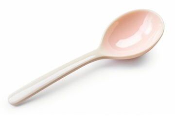 Pink and white plastic spoon for eating, cooking, or serving on a white background