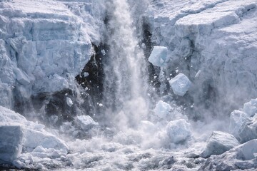 Powerful Waterfall Breaking Ice Shelf During Seasonal Thaw