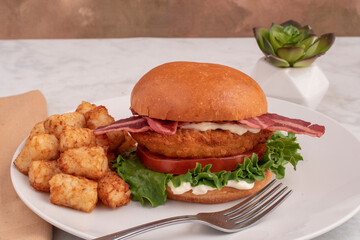 chicken  fillet blt sandwich  with tater tots
