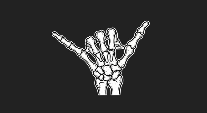 A skeleton hand making the rock on sign with fingers isolated on black