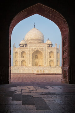 View of the Taj Mahal through an arch at sunrise, Agra, Uttar Pradesh, India