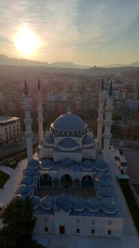 Vertical footage of an aerial drone view of buildings downtown Tirana, Albania