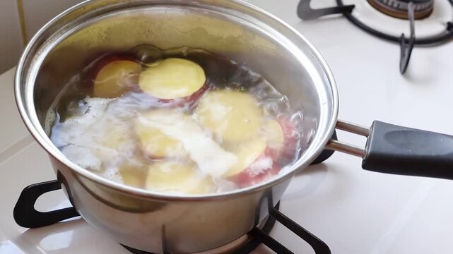 Boiling Sweet Potatoes in Cooking Pot Homemade Kitchen Scene