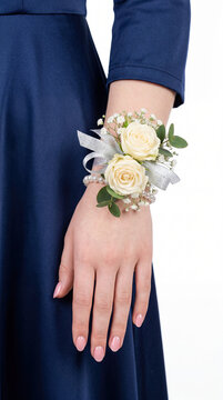 Young woman wearing flower corsage at prom