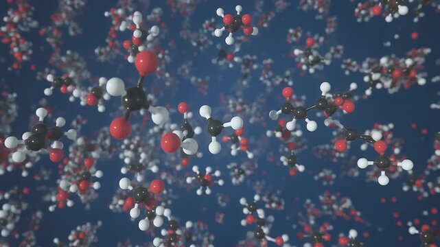 Close-up view of a molecular structure with black, white, and red spheres representing atoms against a blue background.
