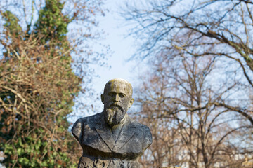Fototapeta premium Historic Statue on the winter mystery old Prague Cemetery, Czech Republic 
