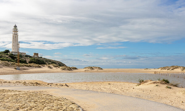 Cape Trafalgar and lighthouse, and Los Canos de Meca beach, on the Atlantic coast of Andalucia, Spain in winter