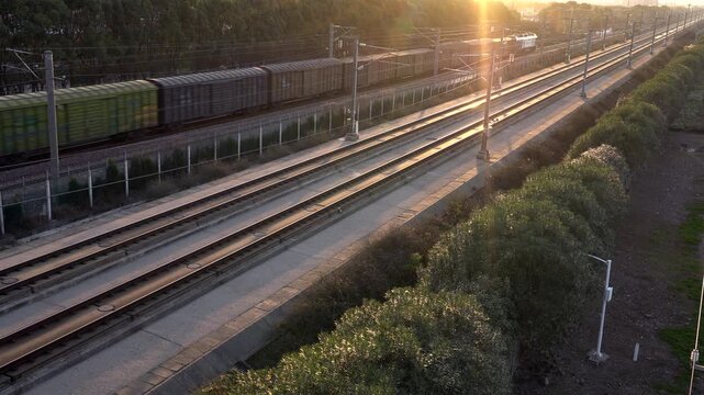 Freight Train on Multiple Railroad Tracks at Golden Hour