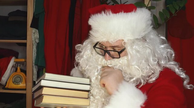 Santa Claus looking at long list with children desire