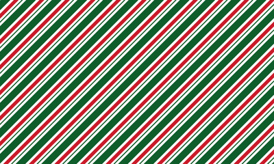 Christmas seamless pattern in classic candy cane design with red and green diagonal stripes on transparent background with 16x9 aspect ratio.
