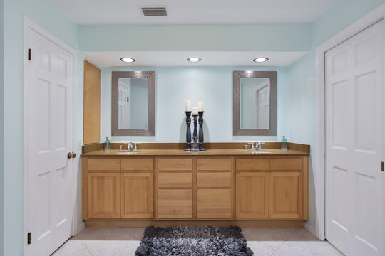 Blue bathroom with large double vanity in a Florida vacation rental house
