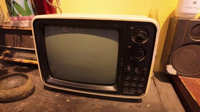 Close-up of a vintage black and white TV set