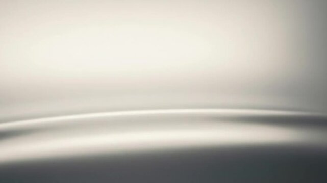 Soft gray gradient background with smooth waves