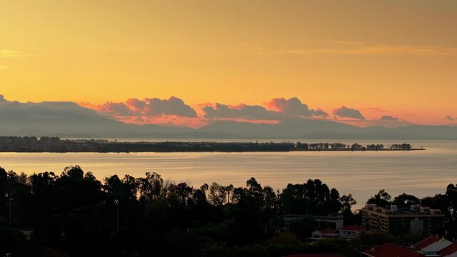 Golden Sunrise Over Dianchi Lake, Kunming with Mountain Silhouettes