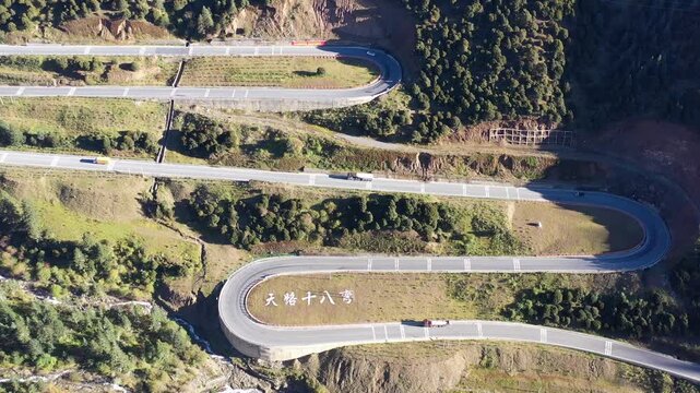 Winding Mountain Highway with Hairpin Bends Aerial View