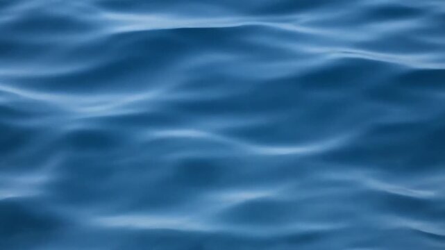 Closeup of Gentle Blue Water Ripples and Waves.