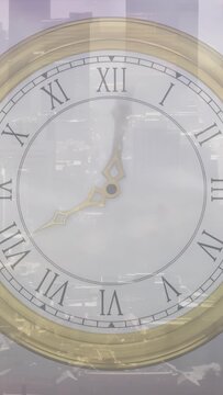 Vertical video: Clock triggered by motor, rotating gold hands clockwise, showing time passing