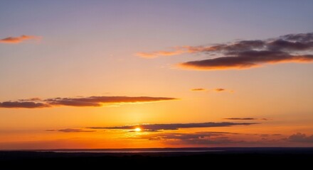 Serene Sunset Landscape with Orange Clouds.