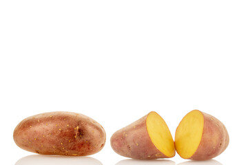 Raw unpeeled pink potatoes isolated on white background, close-up.