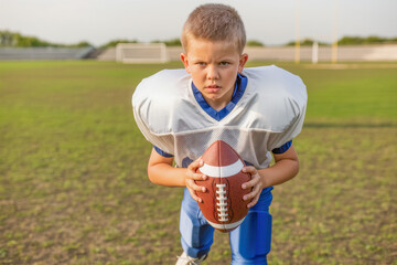 Fototapeta premium boy playing football