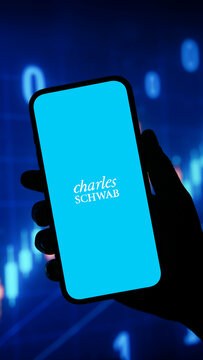 Charles Schwab logo displayed on a smartphone screen &ndash; Delhi, India &ndash; June 04, 2025