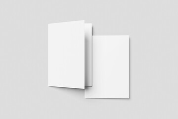 Fototapeta premium Minimalist Blank Folded Brochure or Flyer Mockup on Gray Background