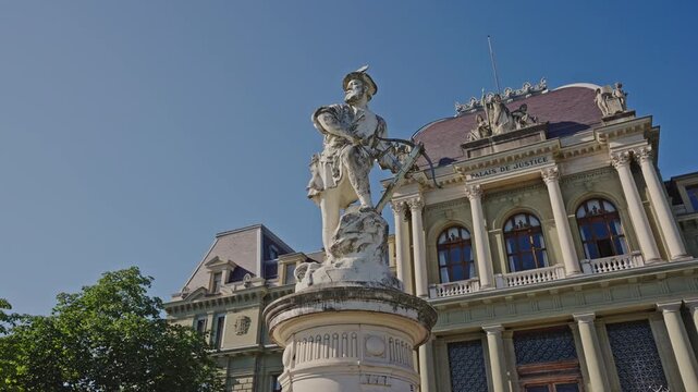 William Tell Statue and Palais de Justice de Montbenon in Lausanne, Switzerland.Filmed on September 9 ,2025.Editorial footage.