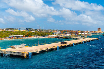 Fototapeta premium A view approaching the cruise terminal in Willemstad, Curacao on a bright morning