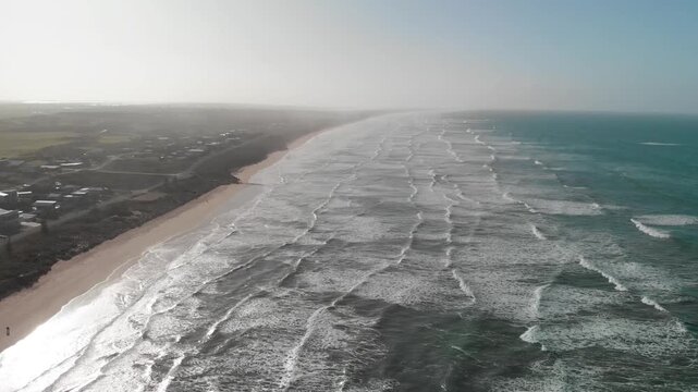 Aerial view of beach and waves in Coorong National Park, Australia. Slow motion