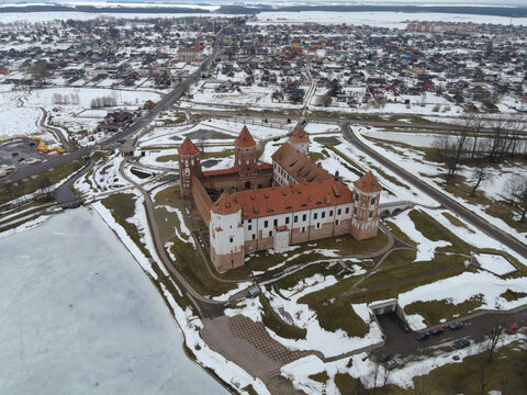 Aerial view of Mir Castle, five towers and moats in Mir, Belarus