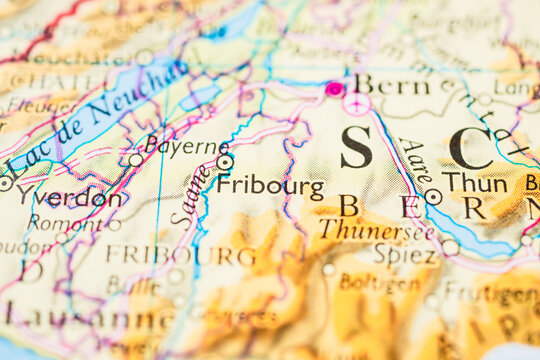 Detailed printed map highlighting Bern and Fribourg area in central Switzerland.