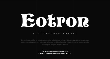 Eotron custom font alphabet, white text on black background, typography design © Money