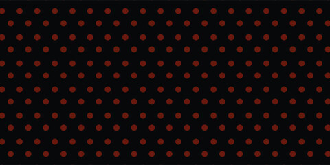 a black background with red polka dot pattern © uboy