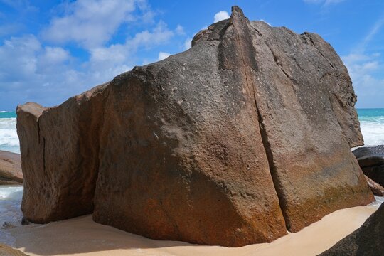 Granite boulders on a deserted tropical beach in Mahe, Seychelles, on the Indian Ocean