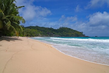 Granite boulders on a deserted tropical beach in Mahe, Seychelles, on the Indian Ocean © eqroy