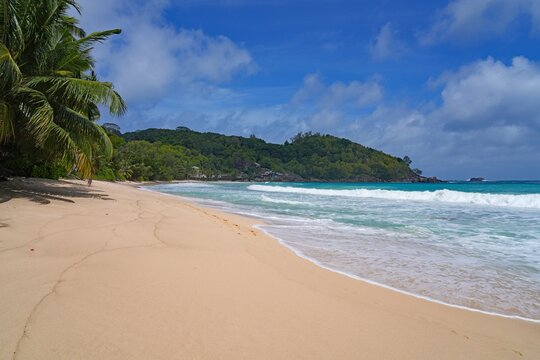 Granite boulders on a deserted tropical beach in Mahe, Seychelles, on the Indian Ocean