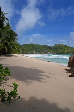 Granite boulders on a deserted tropical beach in Mahe, Seychelles, on the Indian Ocean