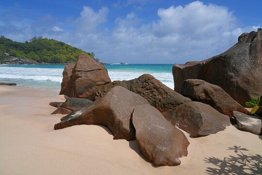 Granite boulders on a deserted tropical beach in Mahe, Seychelles, on the Indian Ocean