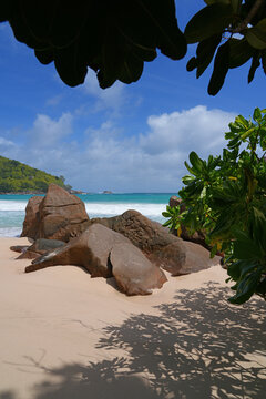 Granite boulders on a deserted tropical beach in Mahe, Seychelles, on the Indian Ocean