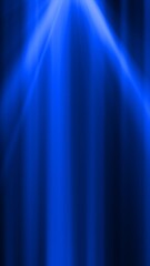Radiant blue spotlight beams shining through a dark gradient space, resembling a dramatic stage light effect