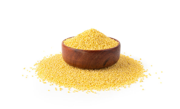 Raw millet grains pile isolated. Little yellow cereal, natural foxtail small seeds