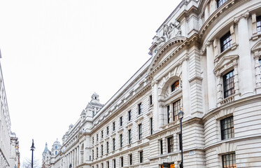 Ornate historical government building facade on Whitehall street in London, United Kingdom under a...