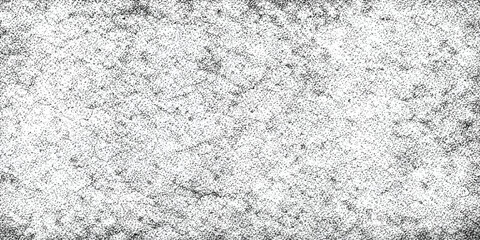 A closeup macro of a rough white paper and fabric texture reveals a subtle marble pattern on a cold grey stone surface resembling winter snow and ice © YEASMIN