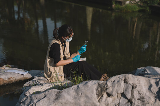 In science, researchers conduct careful experiment and testing on each liquid sample, taking note of water behavior to deepen analysis, research, and understanding of nature and environment.
