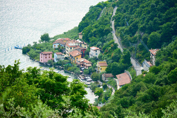 Fototapeta premium Aerial landscape view of Sensole village on Monte Isola, the largest lake island in Lake Iseo, Lombardy, Italy. 