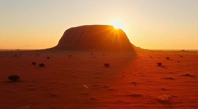 Golden Sunrise over Uluru Ayers Rock in the Australian Outback Desert