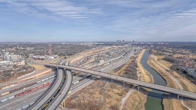 Aerial View of Fort Worth, Texas: Expansive Rail Yard and City Skyline