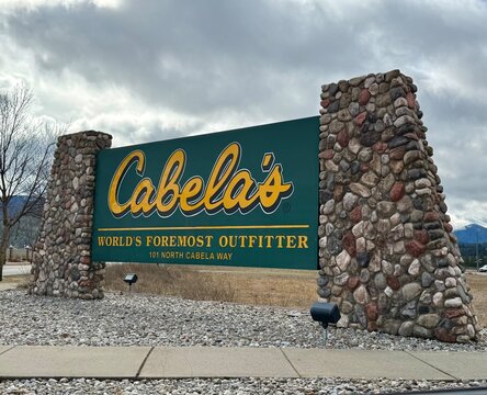 Post Falls, ID - USA - March 7, 2026 - Sign at the entrance to Cabela's. Cabela&rsquo;s is a major American retailer specializing in hunting, fishing, camping, and outdoor recreation merchandise.