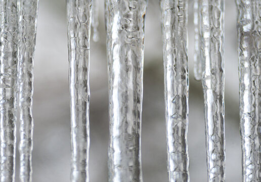 Canada, BC, Delta.  Long icicles outside of a window
