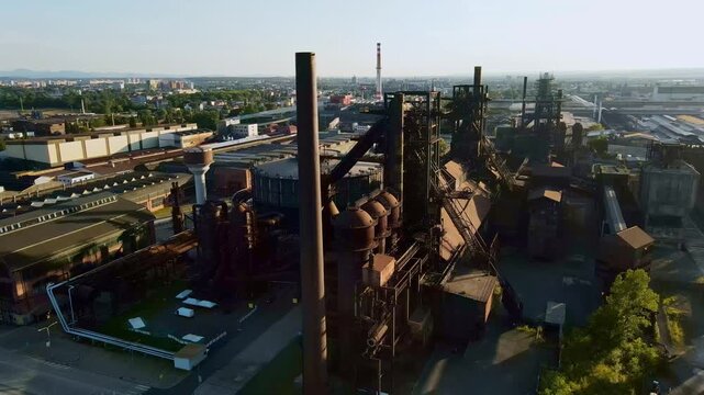 Industrial Dawn Scene. Morning Light Reveals Historic Blast Furnace Area And Surrounding Infrastructure